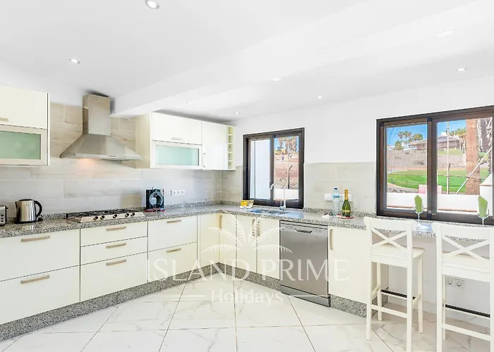 Family In A Heated Pool Complex In Golf Del Sur Fv4