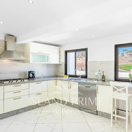 Family In A Heated Pool Complex In Golf Del Sur Fv4